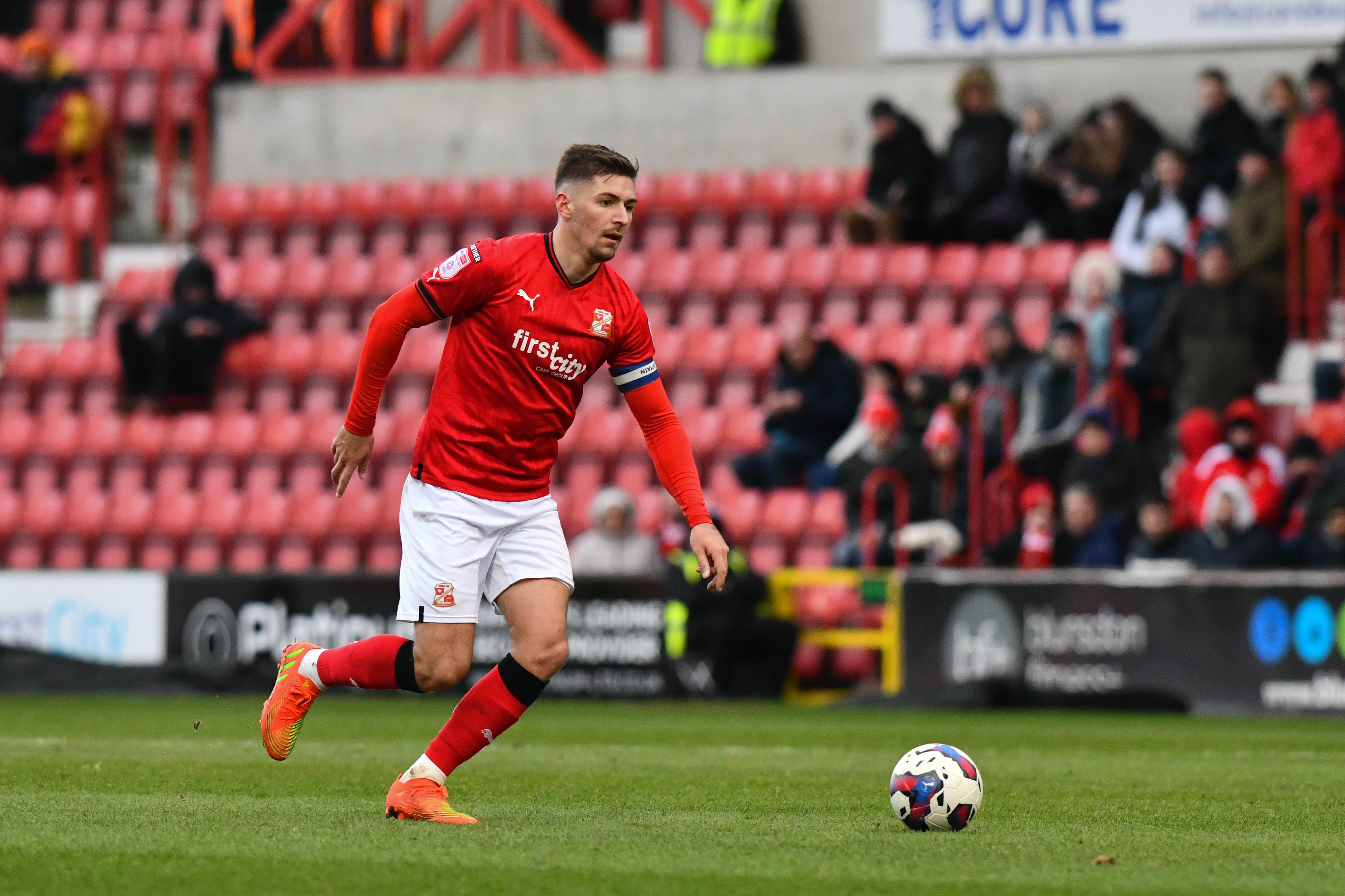 Swindon Town's longest serving player departs to join Colchester United